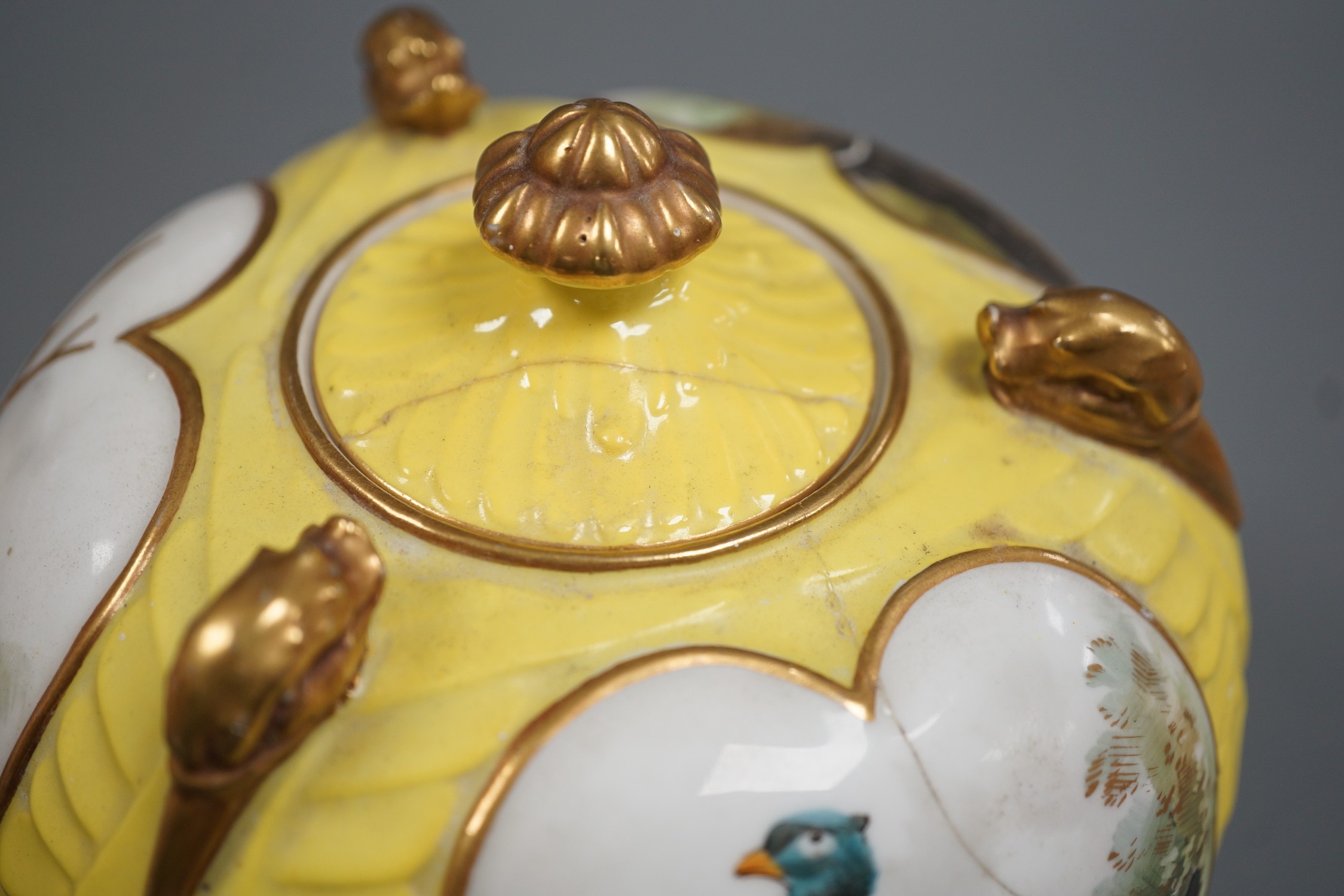 A pair of English porcelain Aesthetic period jars and covers, late 19th century, 14cm total